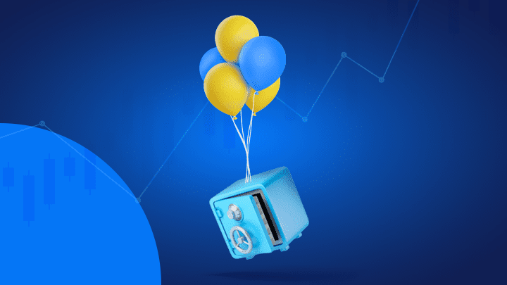 coffre fort volant grâce à plusieurs ballons jaunes et bleus