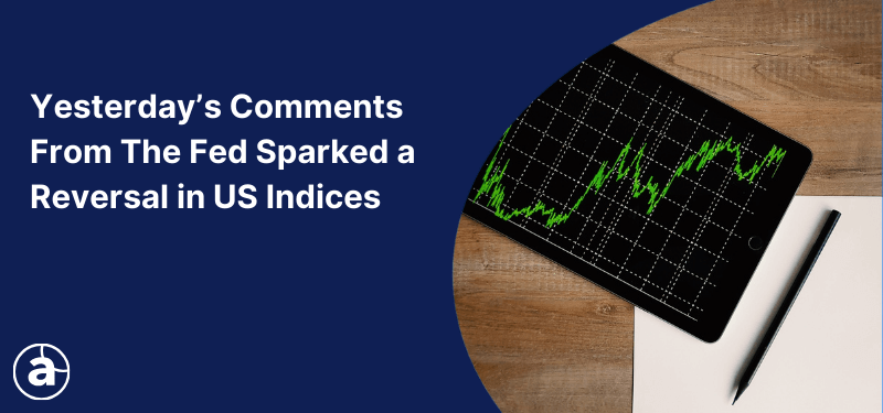 A tablet with an open chart on the screen alongside text on a blue background,"Yesterday’s Comments  From The Fed Sparked a Reversal in US Indices."