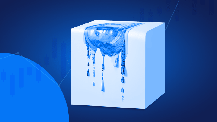 Cubo de gelo com nota a derreter ilustrando como se proteger da inflação