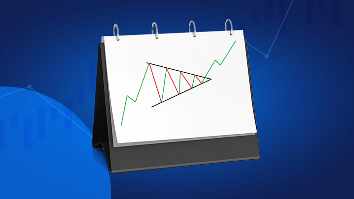 schéma d'un triangle de trading sur une feuille de papier sur fond bleu